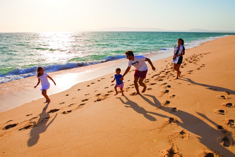 Família em praia Comporta